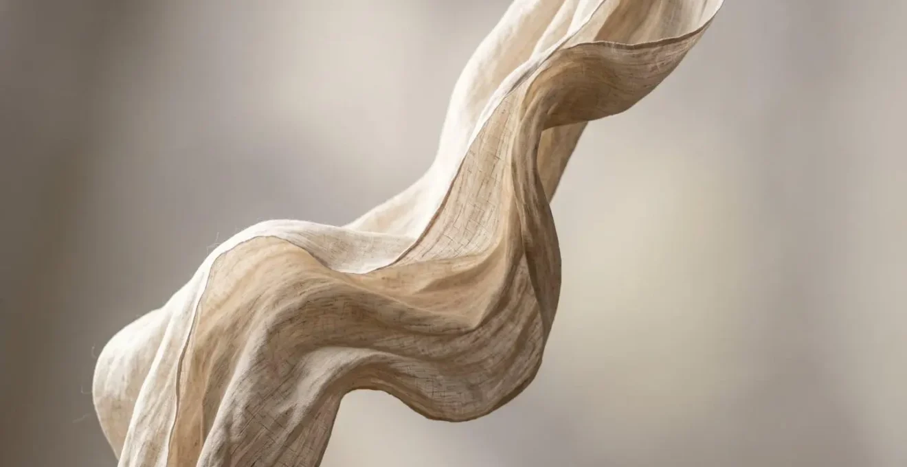 Tissu fluide en lin capturant le mouvement de l'air avec un effet de drapé naturel